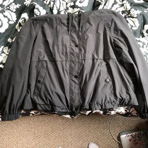 Black raincoat/windbreaker with hood